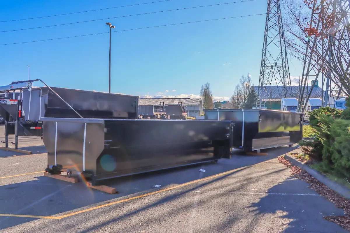Roll-off dumpster ready for waste disposal at job site for 6 Yard Dumpster Rental in Eudora